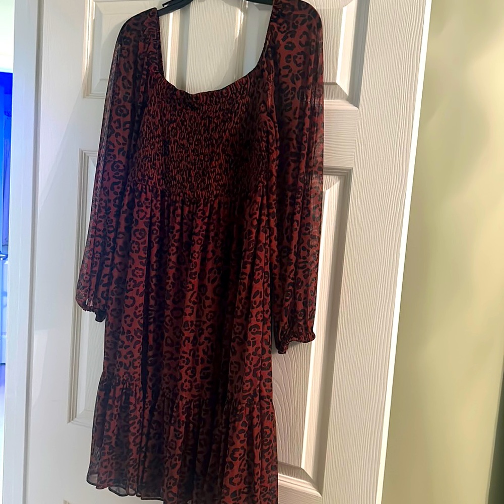 Just… Taylor leopard shear sleeve dress.